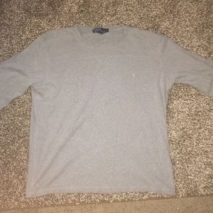 Grey long sleeve polo shirt . Grey polo emblem